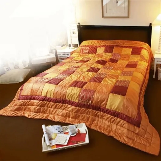 Couvre lit patchwork : orange ou bleu